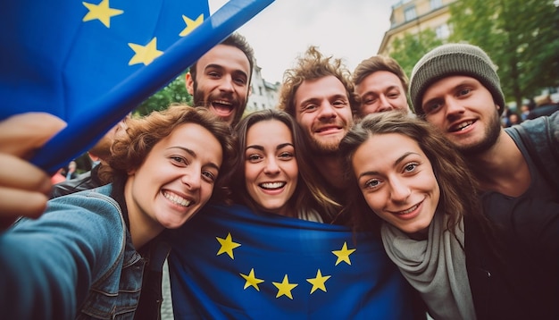 Photo un groupe de jeunes prennent un selfie en arrière-plan, le drapeau de l'union européenne agite