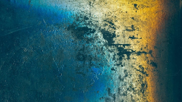 Grunge texture mur patiné bleu taches jaunes