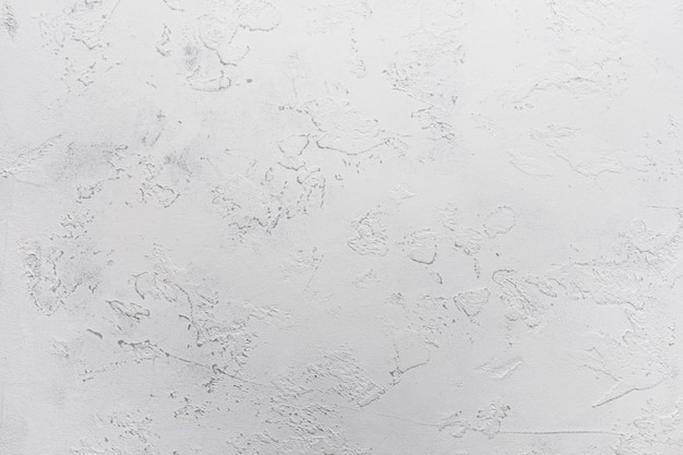 Grungy fond blanc inégal de texture de ciment naturel