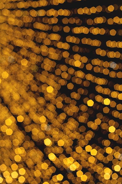 Guirlande lumineuse de Noël sur fond sombre image floue Wallpaper