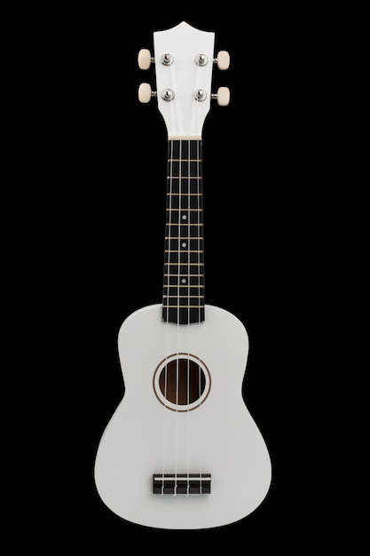 Guitare ukulélé miniature blanche avec manche noir isolé pour le clipsage