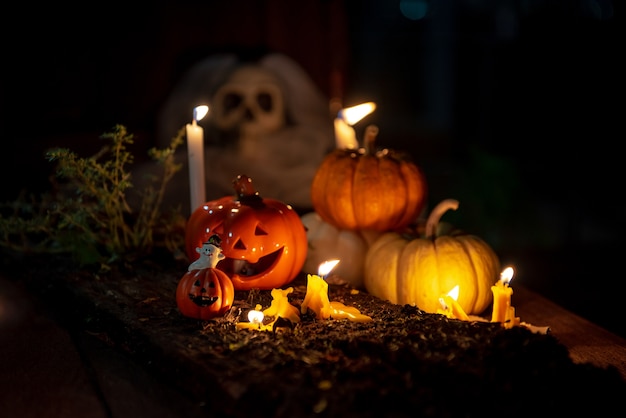 Photo halloween citrouilles et bougies sur bois