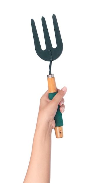 Hand holding tool râteau isolé sur fond blanc