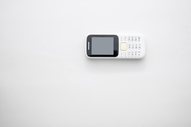 Handphone blanc sur tableau blanc Tableau blanc