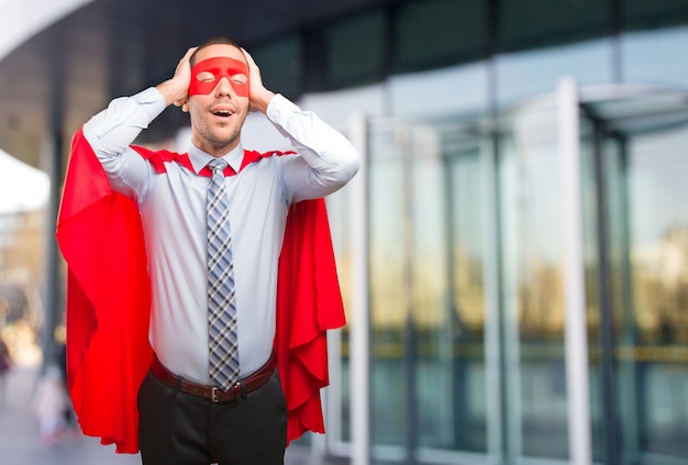 Happy super businessman relaxing