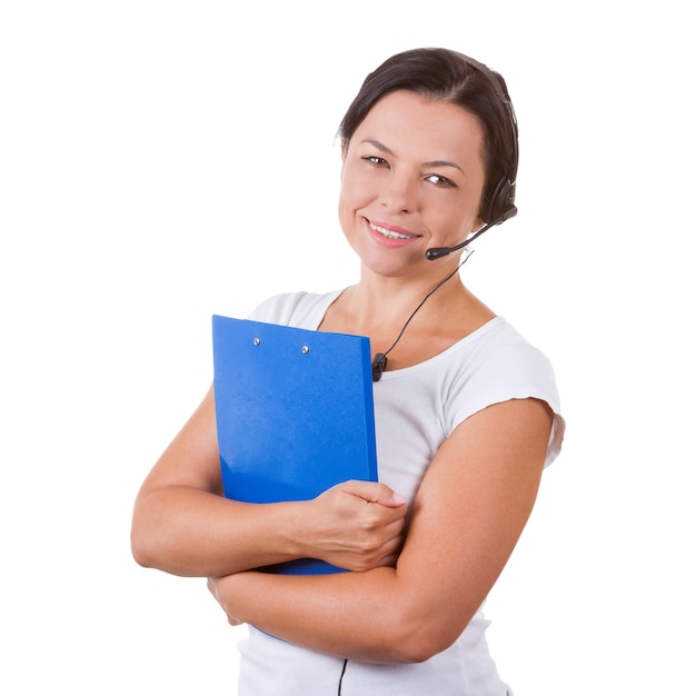 Happy Woman with Headset Working at Callcenter Hold Presse-papiers sur fond blanc