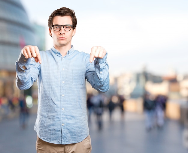 Haughty young man posing