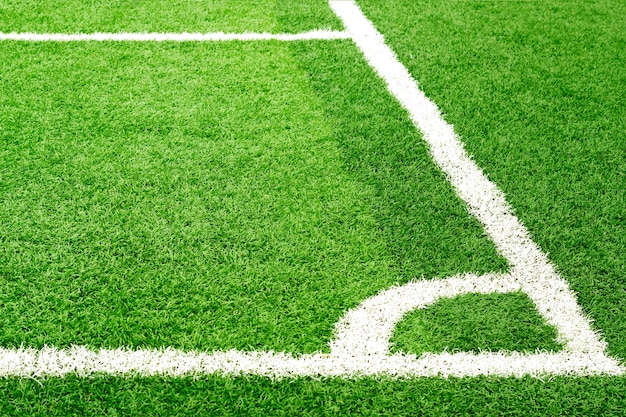 Photo herbe de champ de football vert et ligne de coin blanc