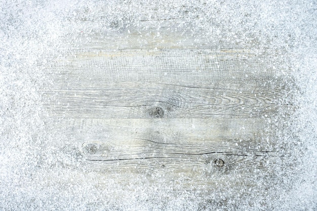 Photo hermoso fondo de madera blanca avec la neige