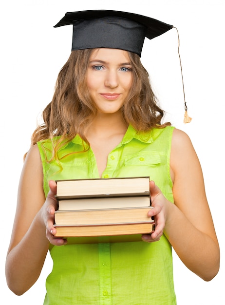 Heureux étudiant en chapeau de graduation