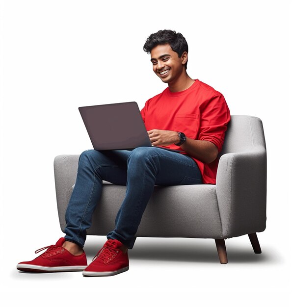 Heureux jeune homme indien travaillant sur un ordinateur portable assis Photo générée par l'IA