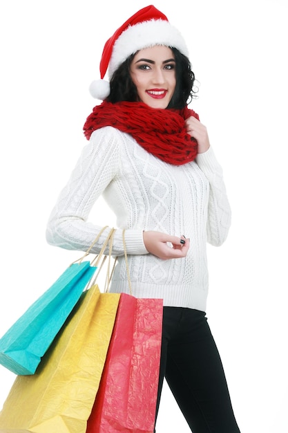 Heureux shopping femme de Noël avec des sacs