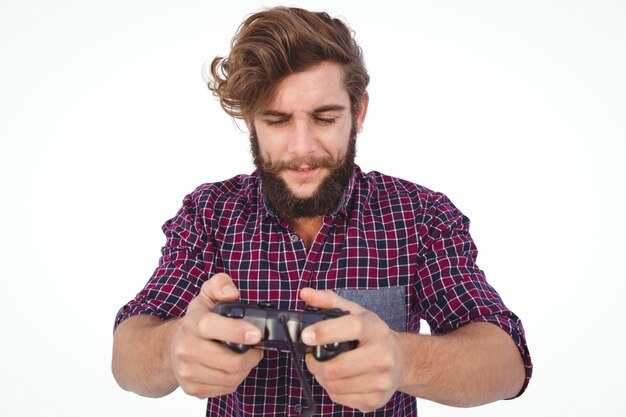 Hipster en train de jouer à un jeu vidéo