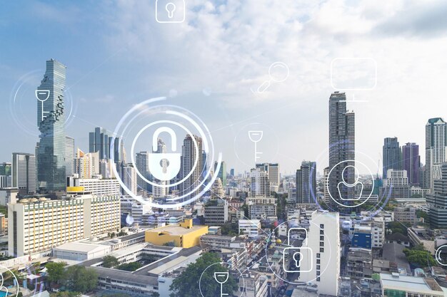 Hologramme d'icône de cadenas sur la vue panoramique sur la ville de Bangkok pour protéger les entreprises en Asie du Sud-Est Le concept de protection de la sécurité de l'information Double exposition