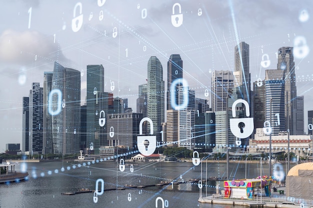 Hologramme d'icône de cadenas sur la vue panoramique sur la ville de Singapour pour protéger les entreprises en Asie Le concept de protection de la sécurité de l'information Double exposition