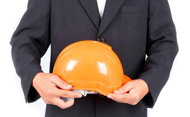 Homme d&#39;affaires avec casque de chantier. Isolé sur fond blanc