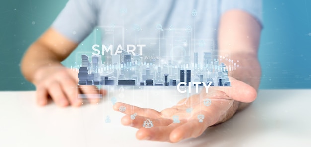 Homme d&#39;affaires détenant une interface utilisateur Smart City avec icône, statistiques et données, rendu 3d