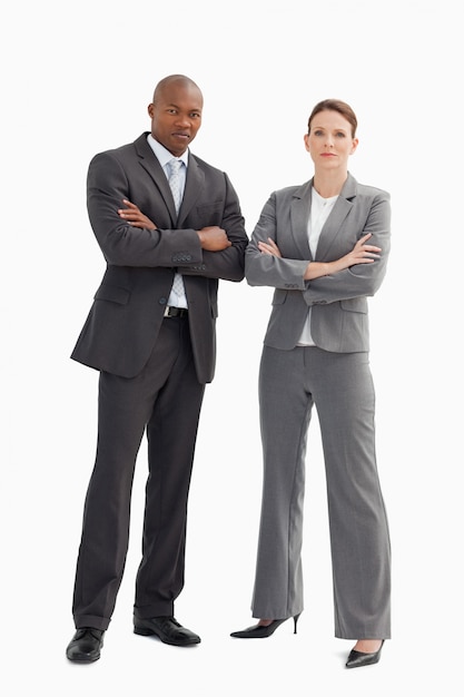 Homme d&#39;affaires et femme avec les mains croisées