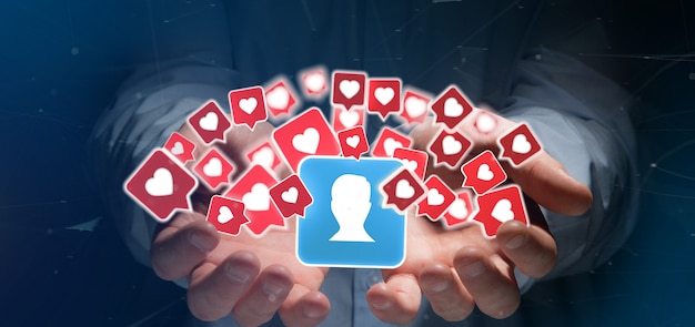 Homme d&#39;affaires tenant comme une notification sur un contact sur un média social