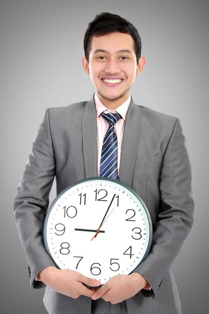 Homme affaires, tient, horloge