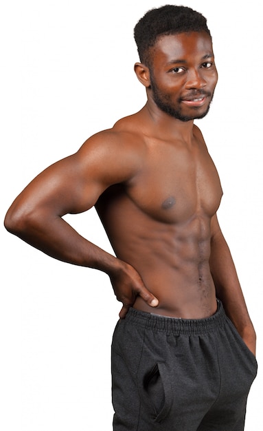 Homme africain musclé isolé sur blanc