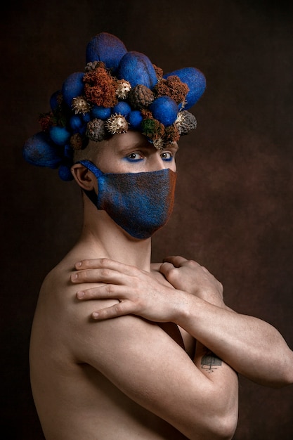 Photo l'homme au masque bleu