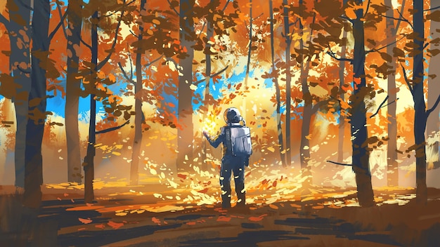 homme au milieu de la forêt d'automne