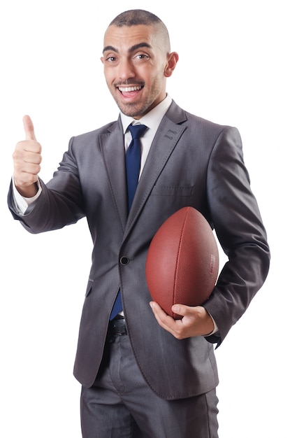 Homme avec ballon de football américain isolé sur blanc