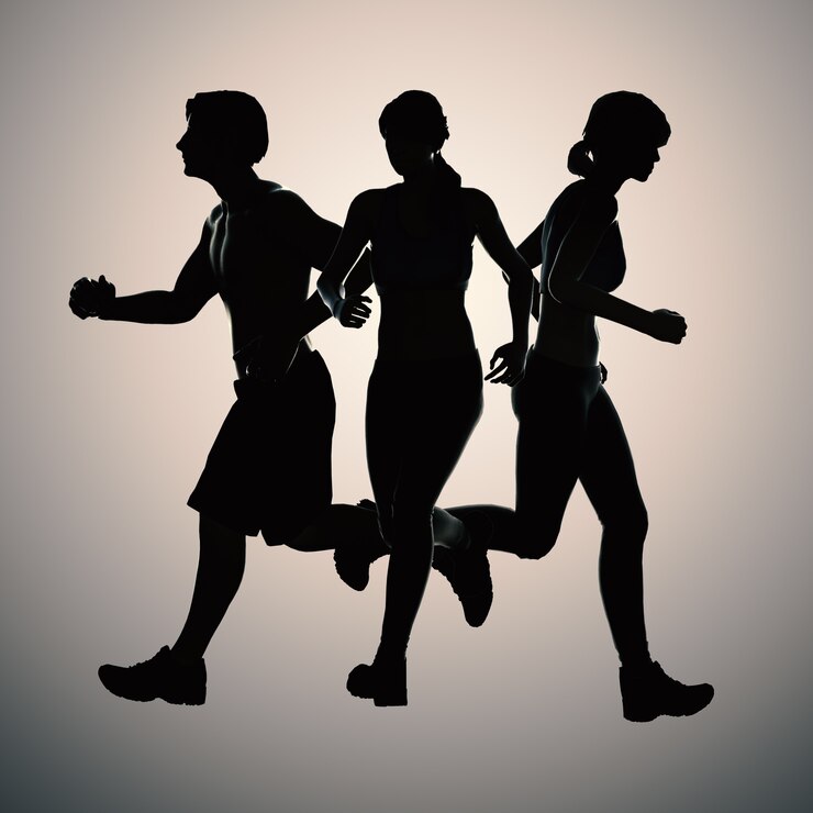Photo homme et femmes de silhouette courant ensemble
