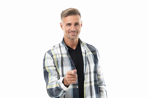 Homme mûr portant une chemise à carreaux et un doigt pointé photo d'un homme mûr aux cheveux grisonnants