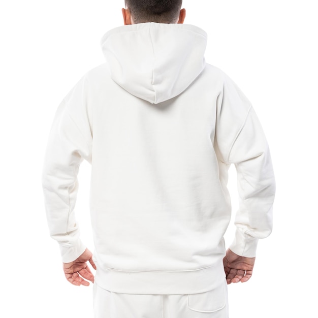 Homme portant un sweat à capuche blanc vierge et un pantalon isolé sur fond blanc