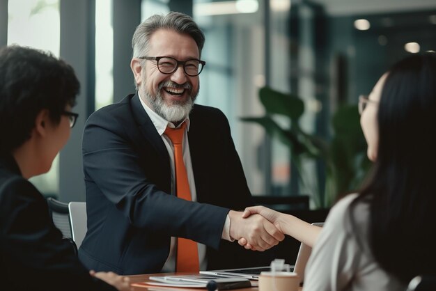 Photo des hommes d'affaires se serrent la main pour saluer un partenaire traitant de fusions et acquisitions d'entreprises concept d'entreprise commune pour les entreprises