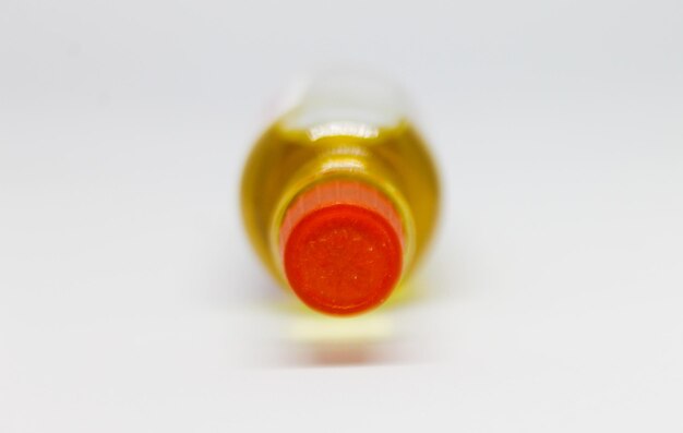 huile de frottement isolée dans une bouteille en verre