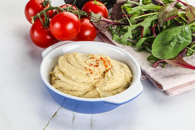 Photo hummus crémeux dans le bol