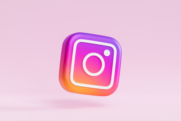 Photo icône du logo instagram sur la surface rose