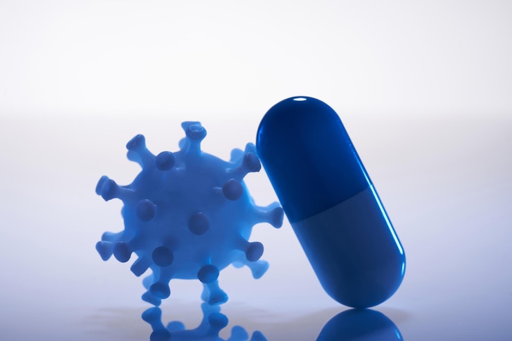 Photo icône imprimée en 3d du coronavirus et de la capsule