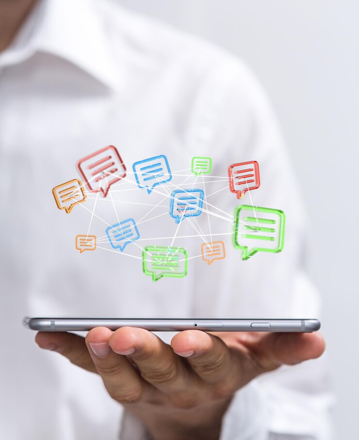 Photo icones de messages rendus en 3d sur une tablette en main masculine en arrière-plan