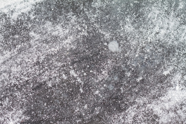 Photo Île texturée d'un lac gelé. neige blanche en surface
