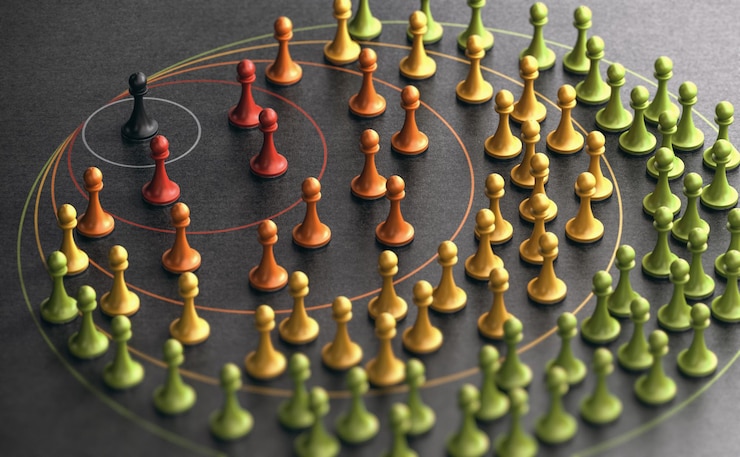 Photo illustration 3d de pions sur fond noir avec des cercles. concept de marketing d'influence et sphères d'influence.