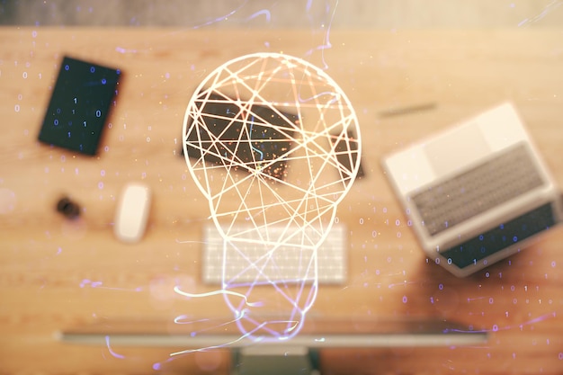 Photo illustration d'ampoule créative sur fond d'ordinateur moderne concept de technologie future multiexposition
