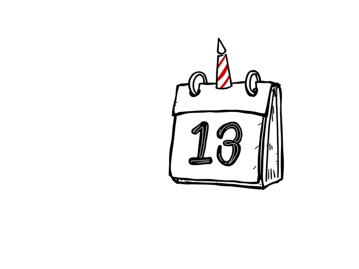Photo illustration dessinée à la main d'un calendrier avec une bougie d'anniversaire le 13