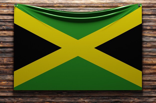 Illustration du drapeau national en tissu de la Jamaïque cloué sur un mur en bois