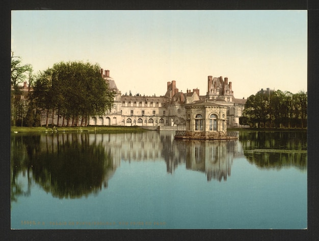 Photo une image d'un château avec un lac en arrière-plan