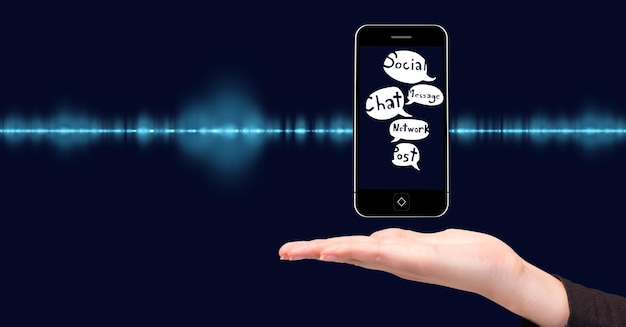 Image composée de main et de smartphone