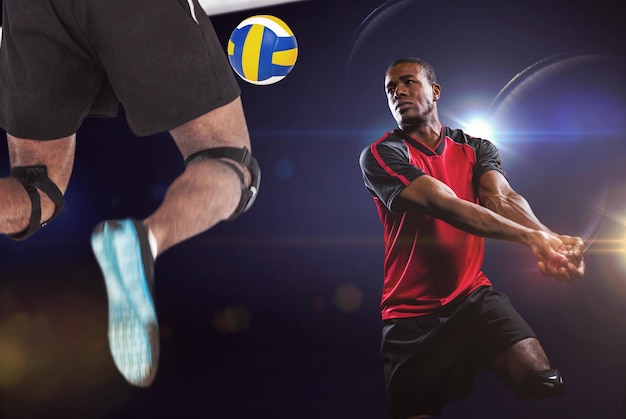 Image composée de vue arrière du sportif posant tout en jouant au volley-ball