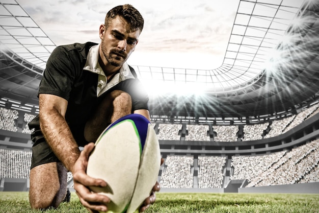 Photo image composite du joueur de rugby masculin de race blanche sur terrain