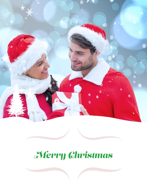 Image composite de jeune couple festif holding gift