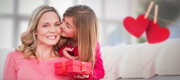 Image composite d'une mère souriante s'embrassant par sa fille