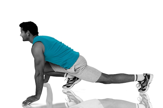 Photo image composite de la vue latérale d'un homme en forme faisant des exercices d'étirement