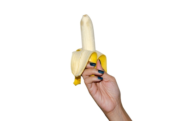 Image coupée d'une femme tenant une banane sur un fond blanc